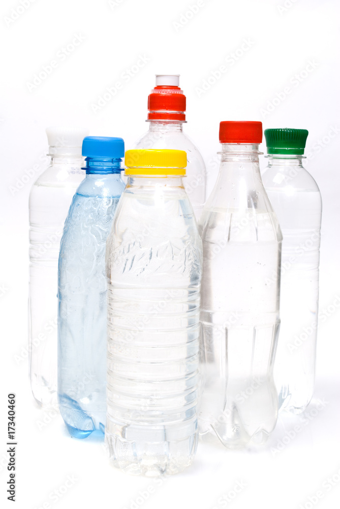 Plastic bottles of mineral water isolated on white background Plastic bottles of mineral water isolated on white background