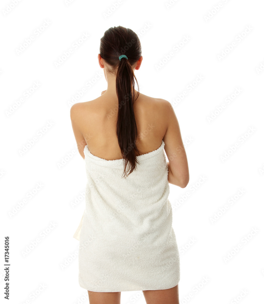 Beautiful young woman with towel