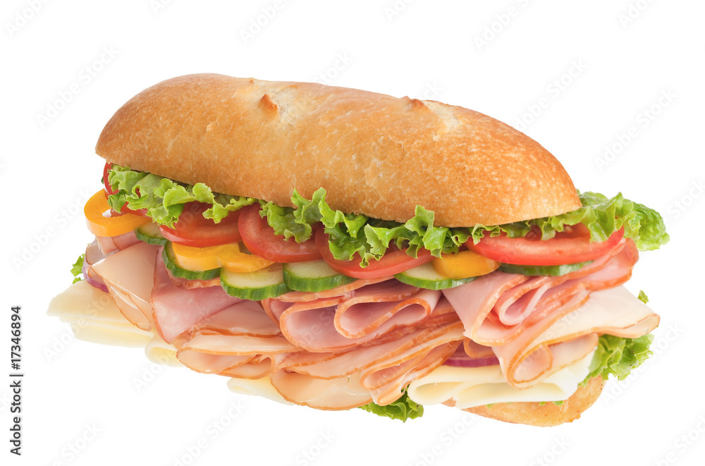 Large ham & turkey submarine sandwich on white Large ham & turkey submarine sandwich on white