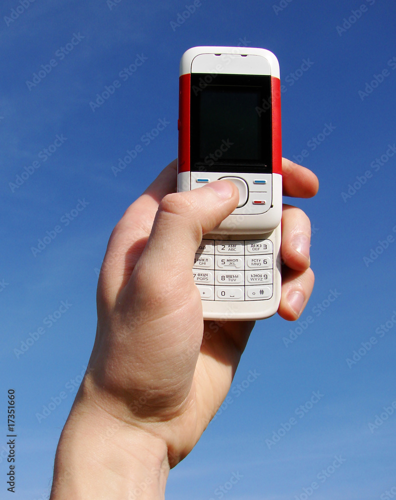 hand holding a mobile hand holding a mobile