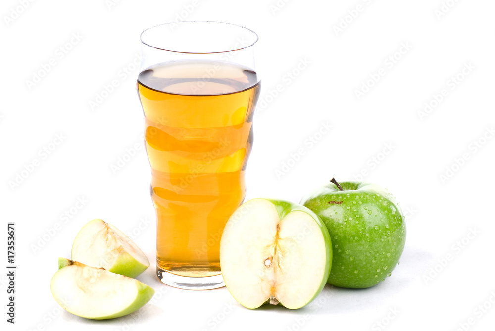 A glass of apple juice whith apples isolated on white A glass of apple juice whith apples isolated on white