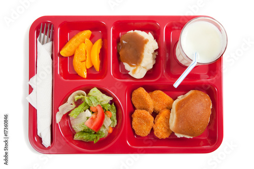 School lunch tray with food on it on a white backgrounf