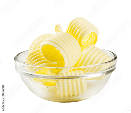 Butter curls in a glass bowl