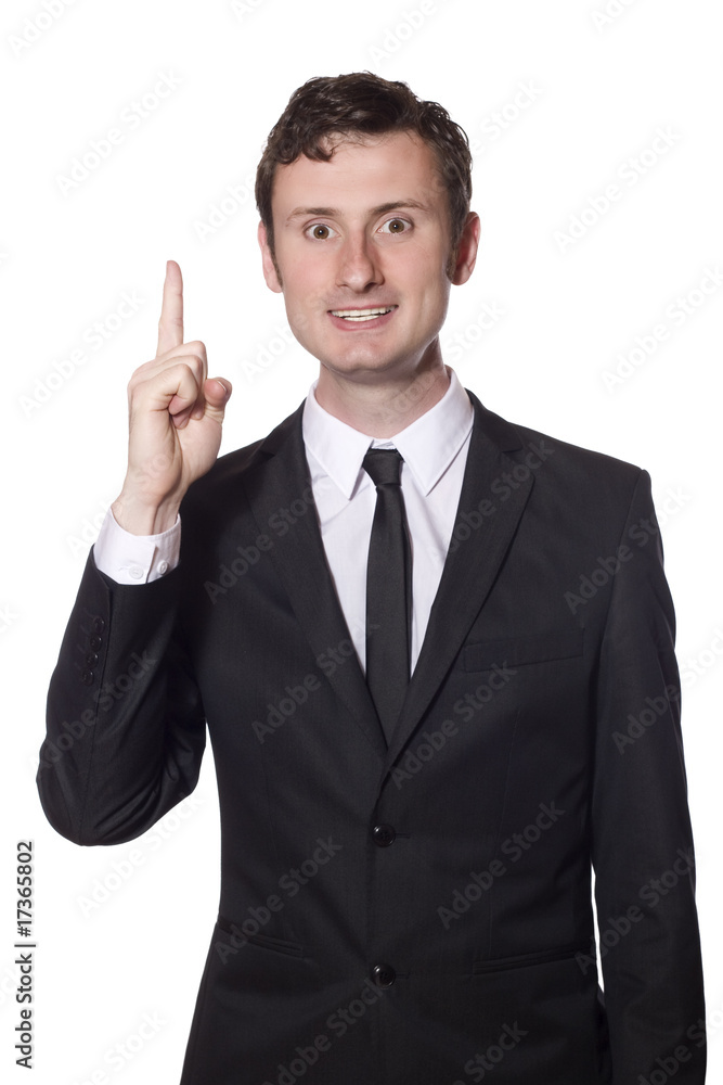 businessman in a black suit has an idea businessman in a black suit has an idea