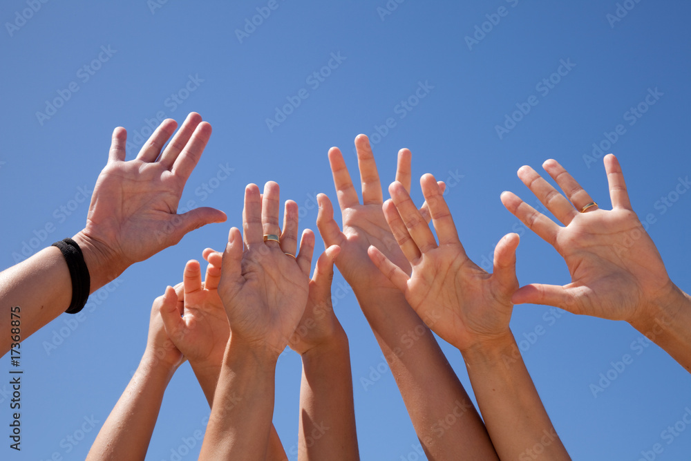hands raised to the sky hands raised to the sky