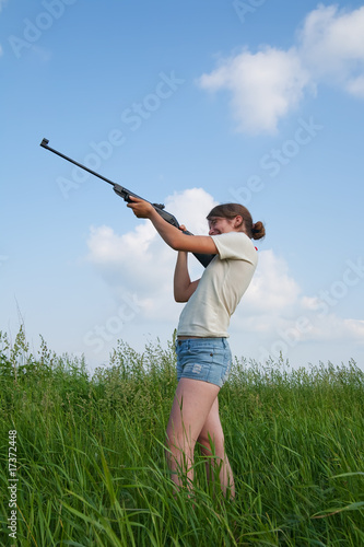 Girl with air rifle
