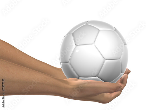 white 3D soccer ball held in hands by an adult male