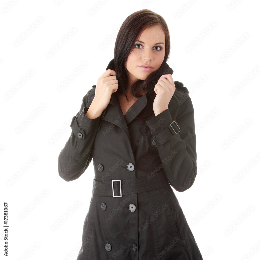 Fashion model in black coat