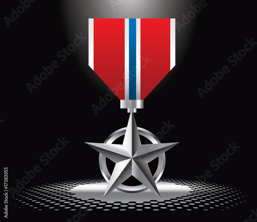 Military medal under spotlight