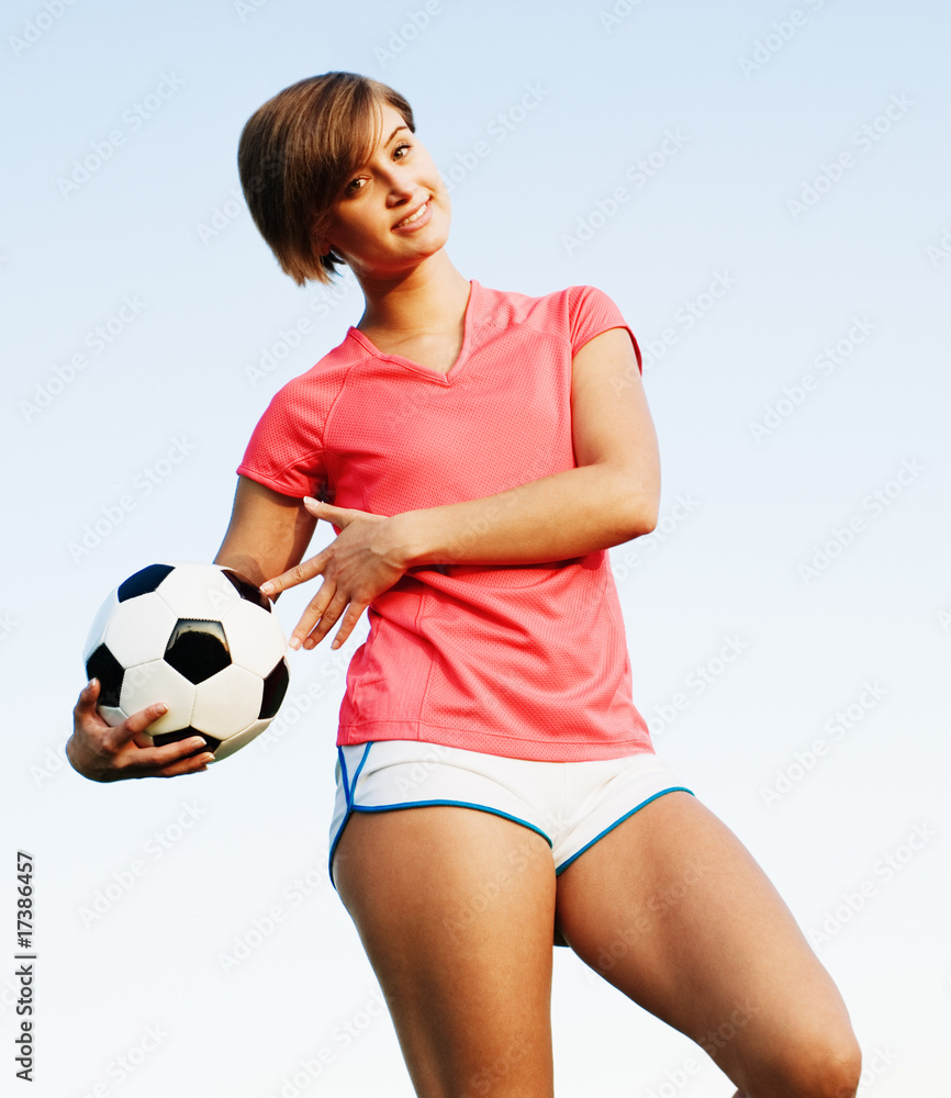 Young Woman Playing Soccer