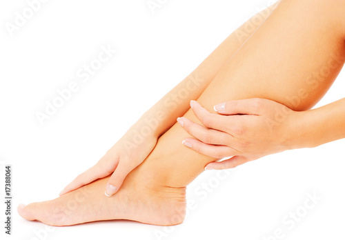 Hands Massaging Leg