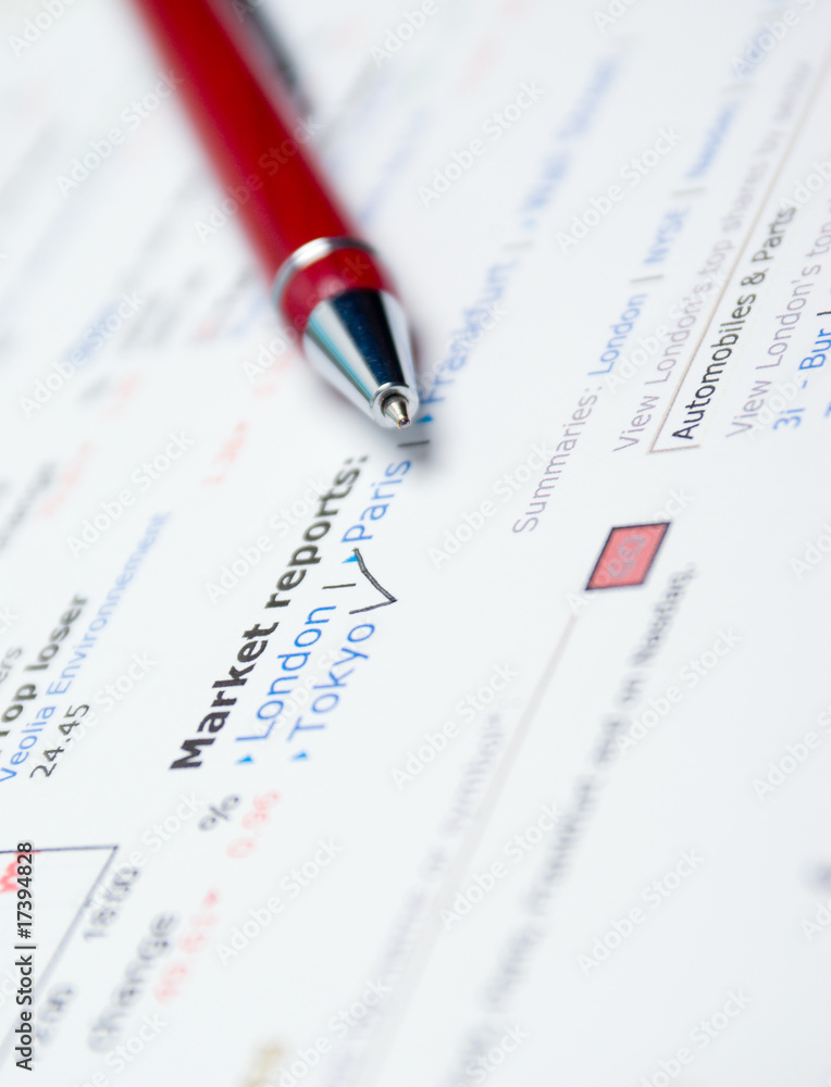 Business accessories on a background of diagrams. Business accessories on a background of diagrams.