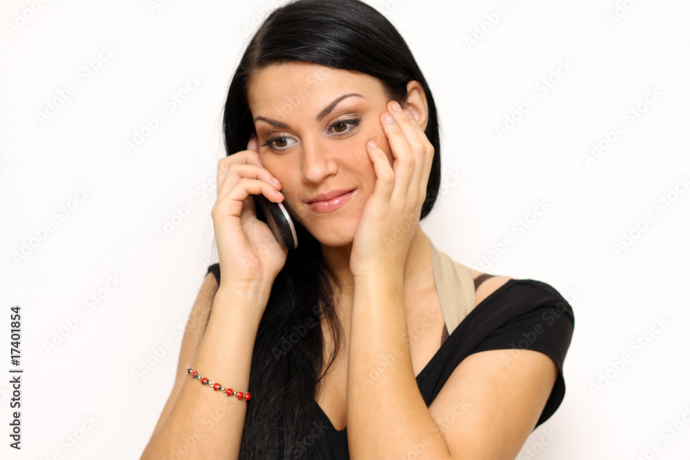 Closeup portrait of a funny woman with a phone standing indoors Closeup portrait of a funny woman with a phone standing indoors