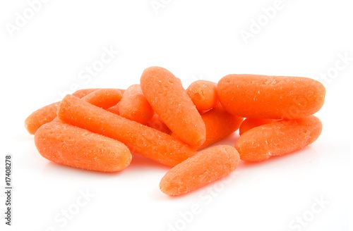 fresh raw carrots over white background