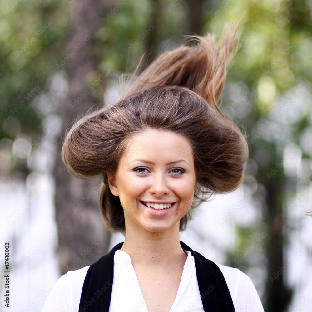 Hair up, Closeup portrait of a happy young woman Hair up, Closeup portrait of a happy young woman