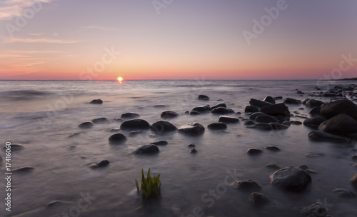 Sunset over ocean. Can also be used as a dawn.