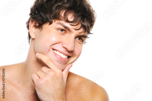 handsome happy man with clean-shaven face photo