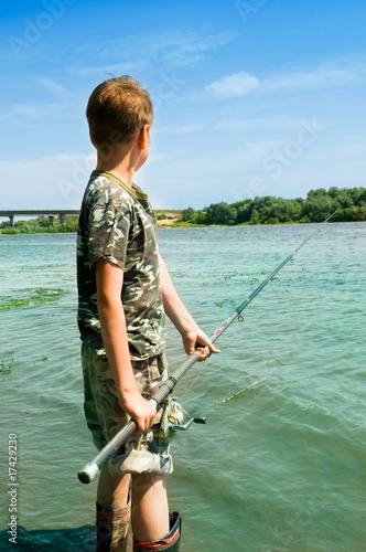 Boy fishing on the lake