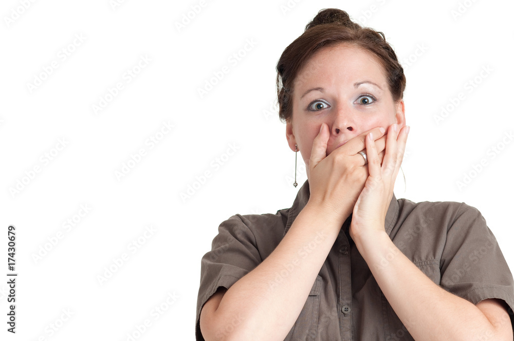 surprised young woman with both hands placed over the mouth surprised young woman with both hands placed over the mouth