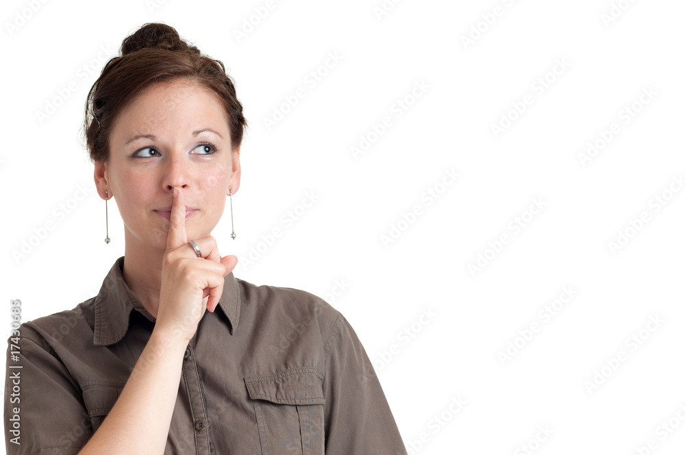 young woman gesturing for quiet. Isolated over white young woman gesturing for quiet. Isolated over white