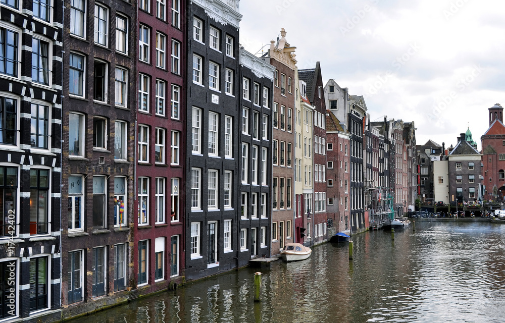 Typical buildings facing a canal in Amsterdam.