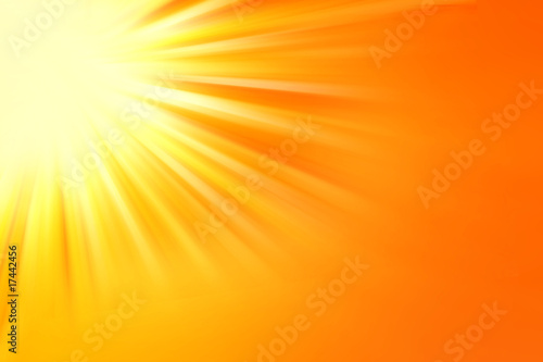 Bright orange sun rays background