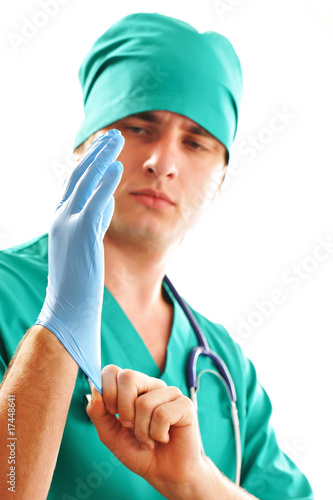 Pulling on surgical glove