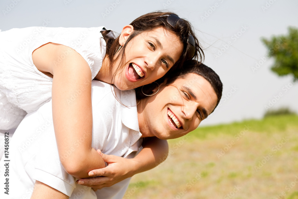 young Couple Piggybacking
