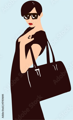 Woman in black with short hair