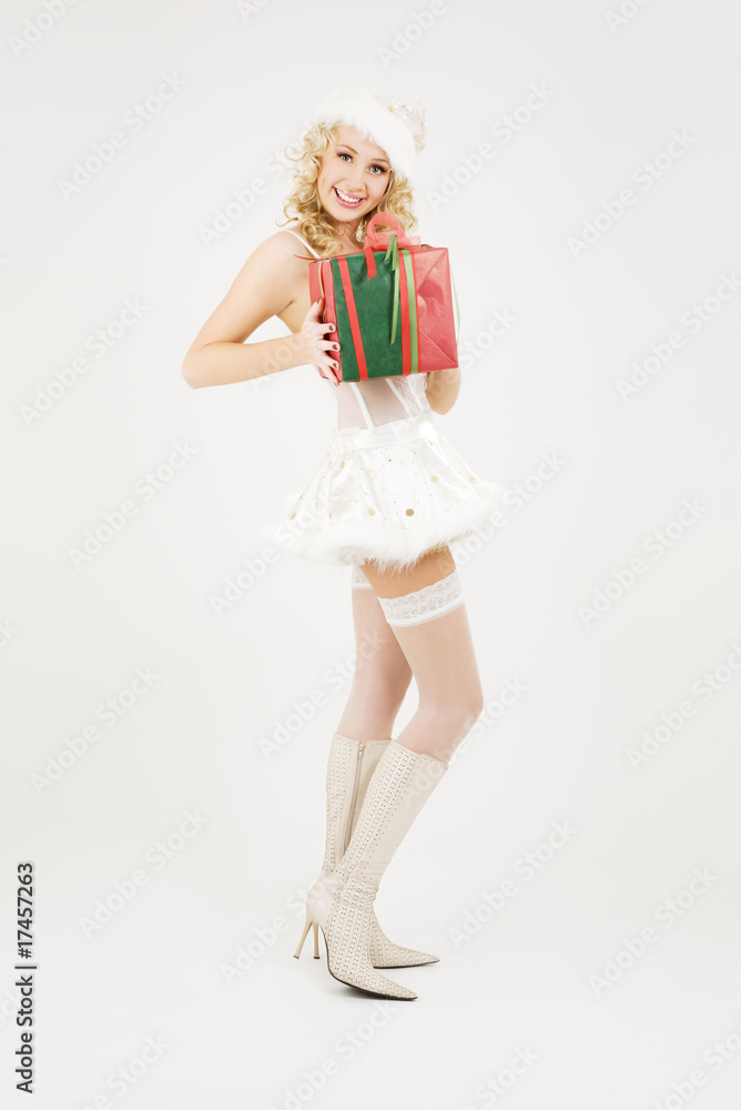 cheerful santa helper girl with gift box