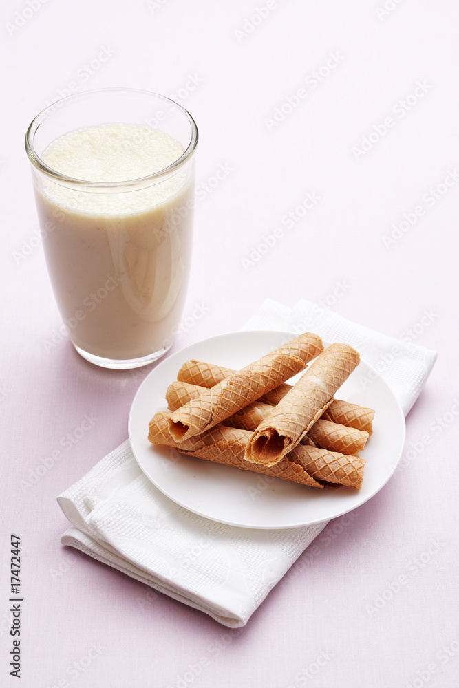 milk shake with wafers and napkin milk shake with wafers and napkin