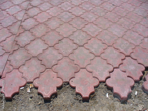 Unfinished red paving stones Ulan Bataar in Mongolia photo