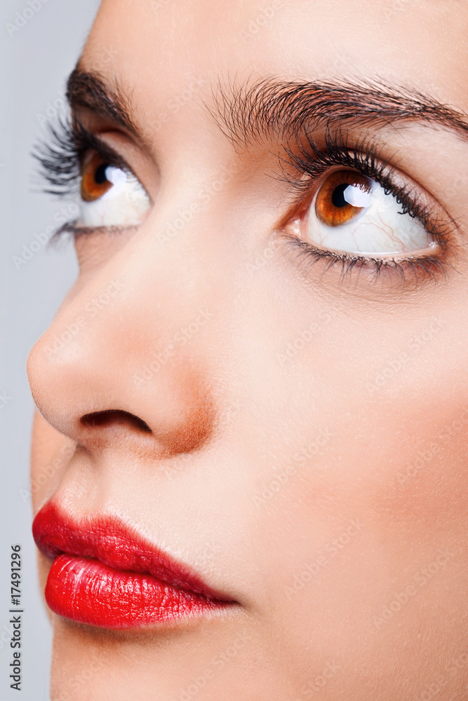 Brown eyes and red lips Brown eyes and red lips