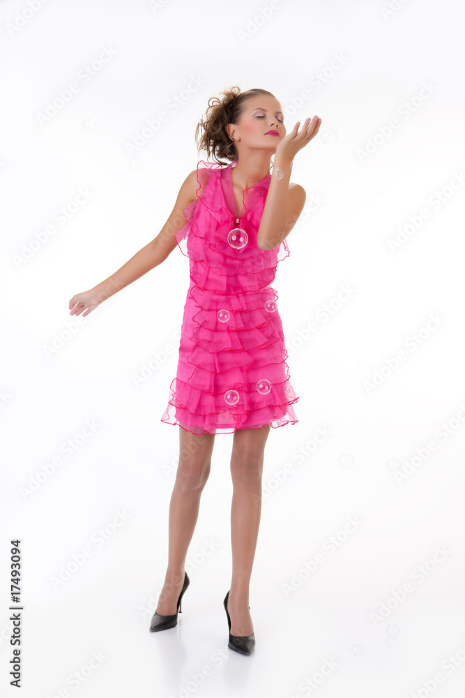 Young Emotional Woman In a Pink Dress