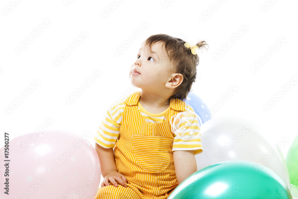 Happy baby with baloons on her first birthday Happy baby with baloons on her first birthday