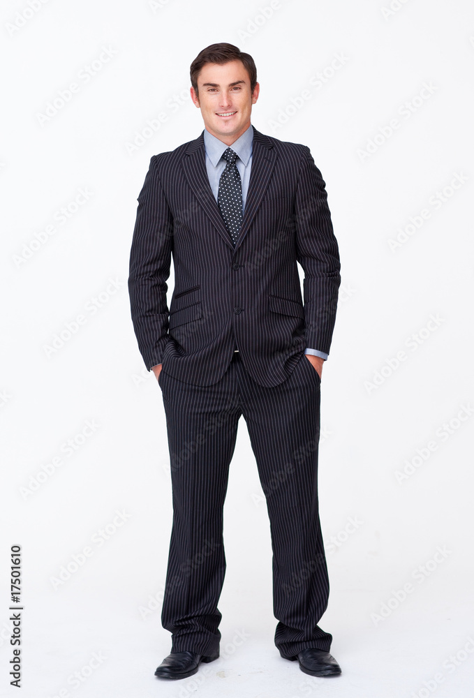 Smiling businessman with his hands in his pockets Smiling businessman with his hands in his pockets