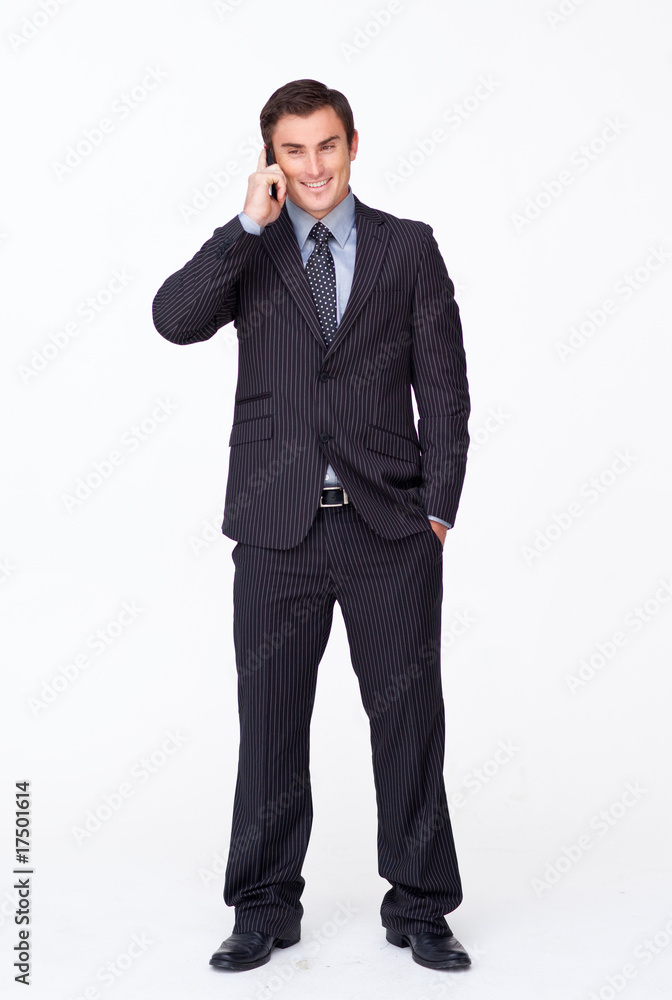Attractive businessman on phone against white Attractive businessman on phone against white