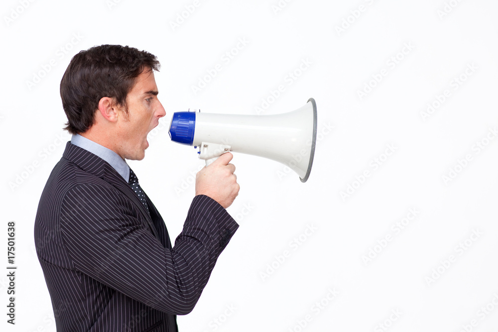 Profile of a businessman shouting through a megaphone Profile of a businessman shouting through a megaphone