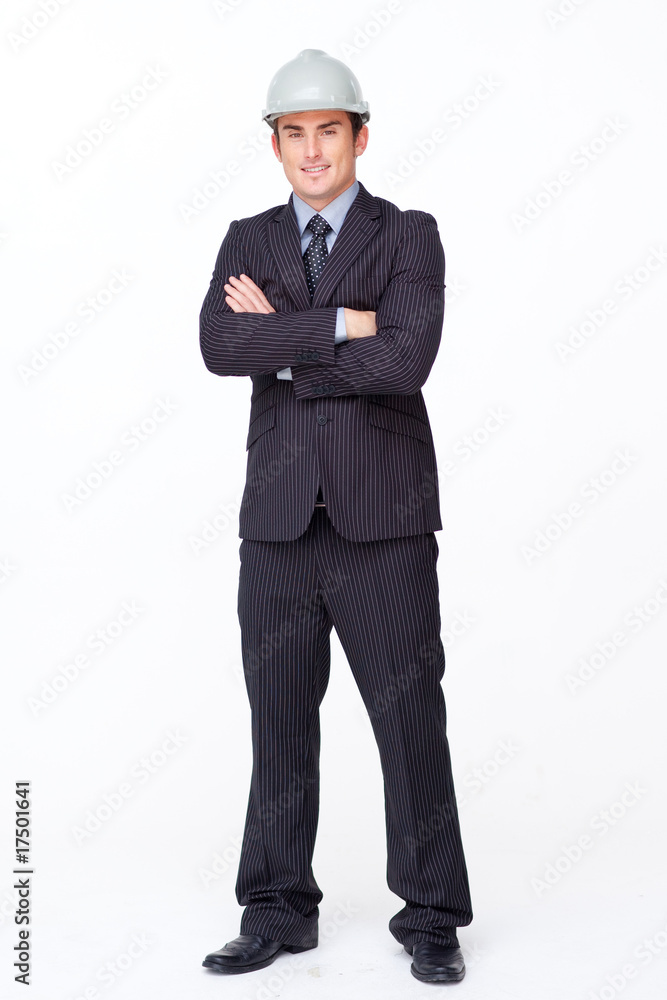 Standing attractive businessman with folded arms Standing attractive businessman with folded arms