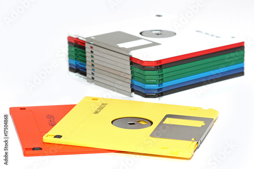Many colored compute diskette isolated on white