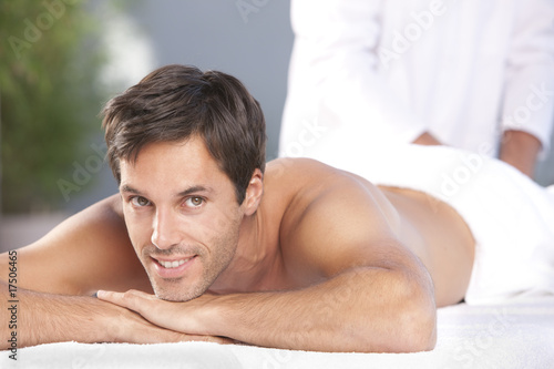 man lying on the towel