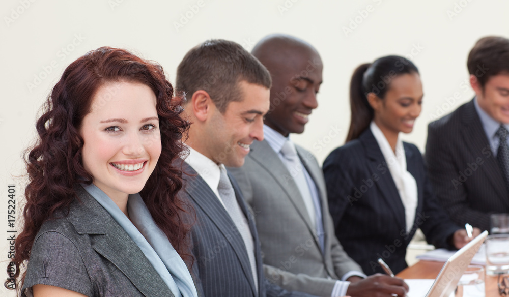 Smiling businesswoman in a meeting Smiling businesswoman in a meeting
