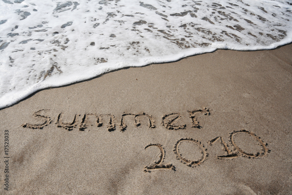 Fototapeta premium Years summer 2010 in sand