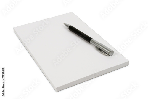 White isolated notpad with a ball pen