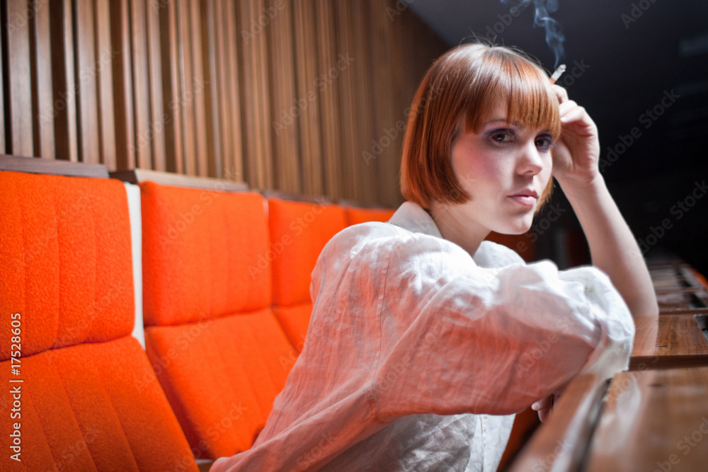 Obraz premium young woman smoking