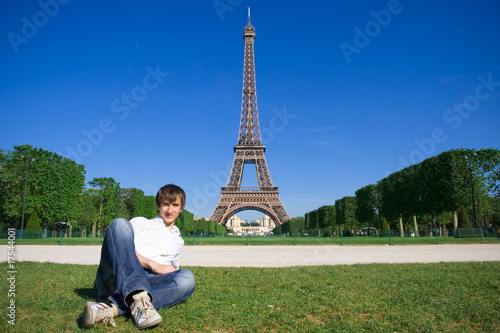 Young man lying on the Champs de Mars photo