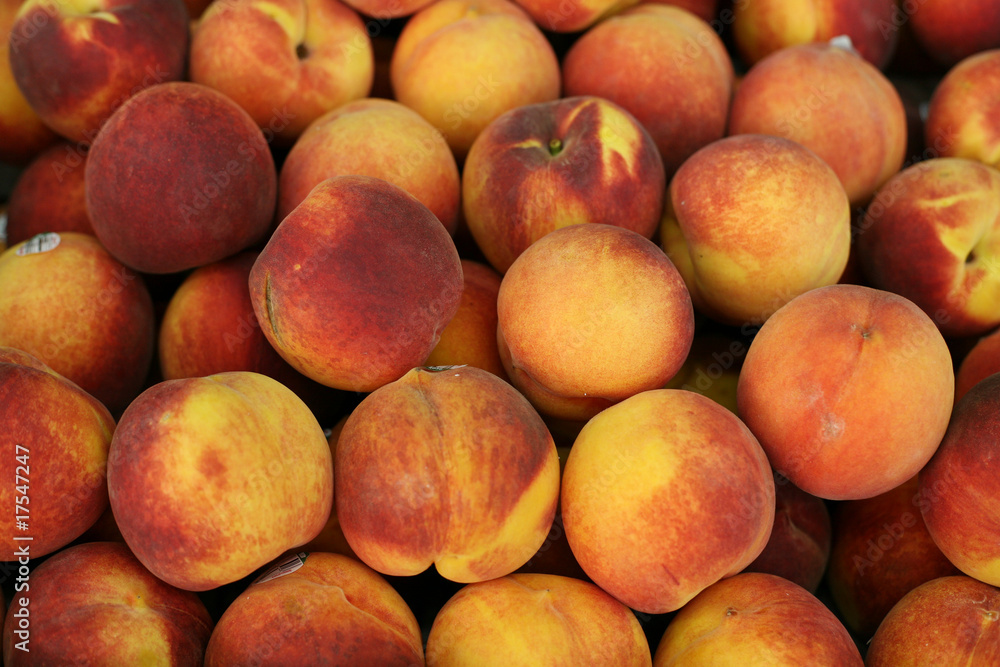 close-up of juicy ripen peaches as background close-up of juicy ripen peaches as background