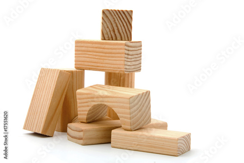 Fototapeta Naklejka Na Ścianę i Meble -  Wooden building blocks over white background