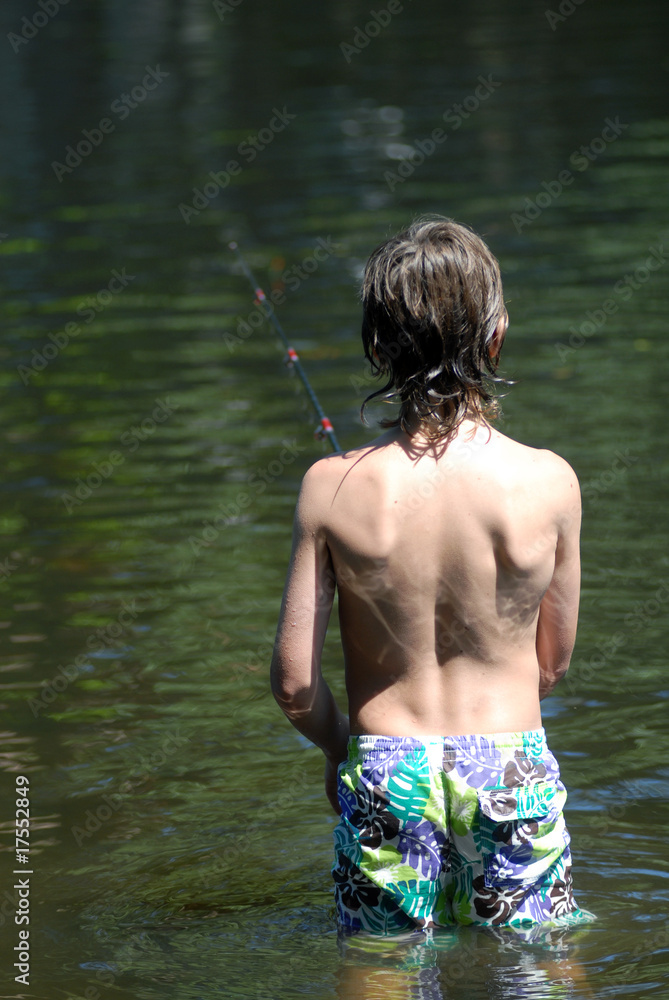 Fototapeta premium Niño pescando