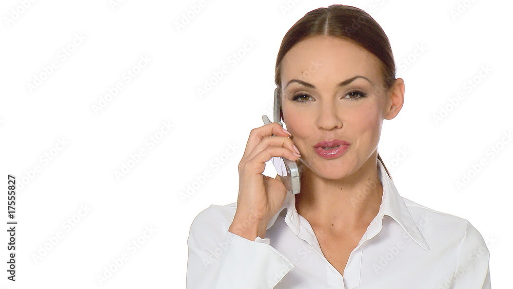 Beautiful young businesswoman is using mobile phone Beautiful young businesswoman is using mobile phone